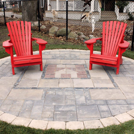 Stonework patio with inlayed design at Hospice Simcoe